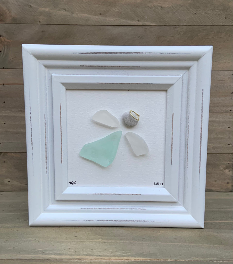 White wood 4x4 table top frame with sea glass angel. Genuine White Sea glass angel wings and genuine sea foam body.